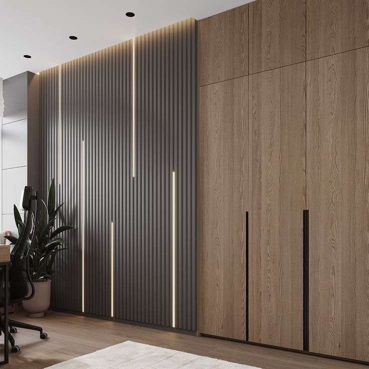 Timber wall cladding with slatted panels and concealed lighting
